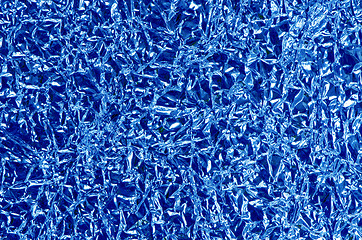 Image showing Bent painted foil background closeup details 