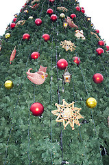 Image showing Synthetic Christmas tree decorated toys 