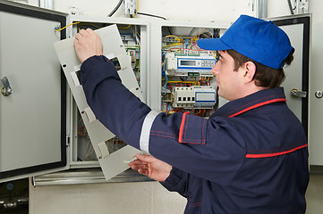 Image showing Electrician at work