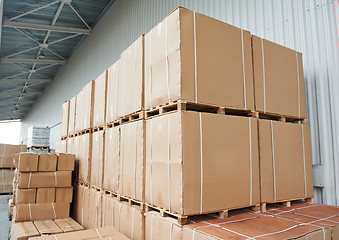 Image showing warehouse cardboard boxes arrangement outdoors