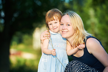 Image showing mother and child outdoors