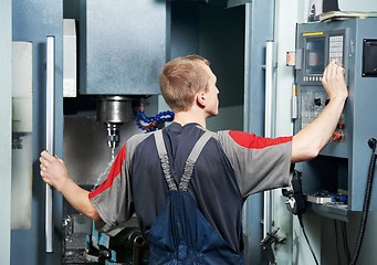 Image showing worker at machining tool workshop