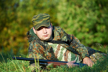 Image showing hunter with rifle gun