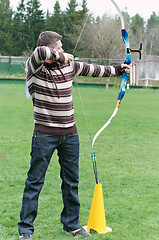 Image showing Archer aiming with bow