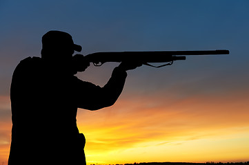 Image showing hunter with rifle gun