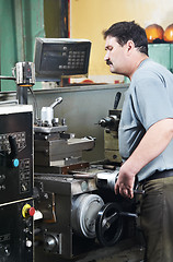 Image showing worker at machining tool workshop