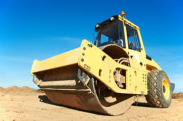 Image showing Compactor at road compaction works