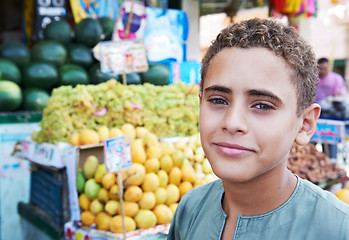 Image showing arab youth invites to purchase fruits