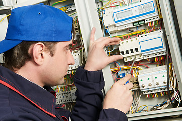 Image showing Electrician at work