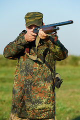 Image showing hunter with rifle gun