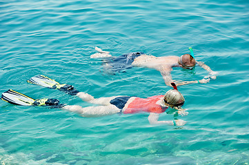 Image showing active couple snorkeling at red sea