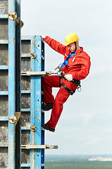 Image showing worker mounter at construction site