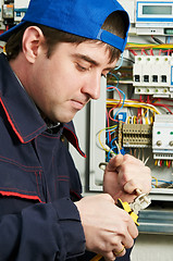 Image showing Electrician at work