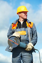 Image showing portrait of construction worker with grinder