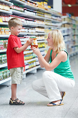 Image showing woman and boy making shopping