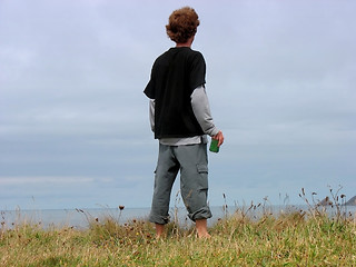 Image showing a boy on a cliff