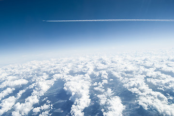 Image showing Above the clouds