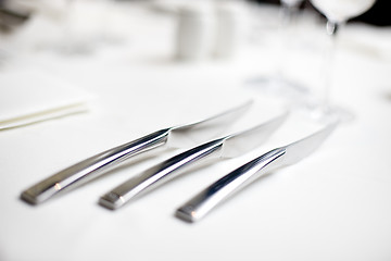 Image showing knives at a table setting