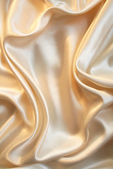 Image showing Smooth elegant gold satin as background