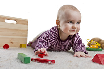 Image showing baby playing on floor