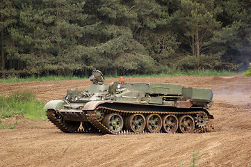 Image showing offroad scenery with driving tank