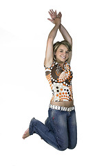 Image showing laughing and jumping cute girl