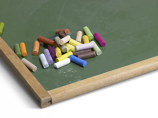 Image showing blackboard and crayons