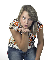 Image showing frontal blond girl blowing a kiss