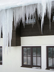 Image showing icicles in front of a house facade