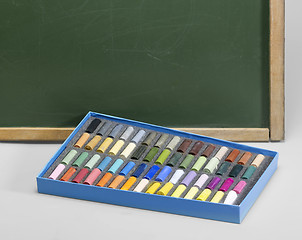 Image showing blackboard edge and crayons