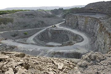 Image showing quarry diggers and dump trucks