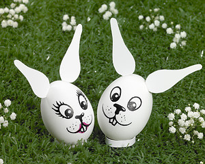 Image showing bunny eggs in green ambiance