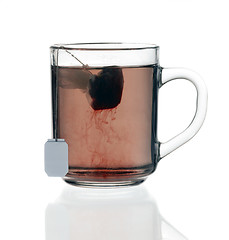 Image showing glass teacup with tea bag