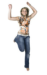 Image showing funny cute girl jumping around