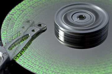 Image showing hard disk and symbolic data