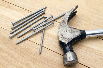 Image showing Old hammer and nails 