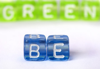 Image showing Text Be green on colorful cubes