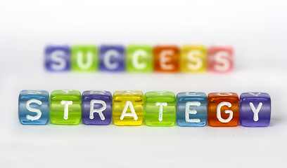 Image showing Text Strategy and success on colorful cubes