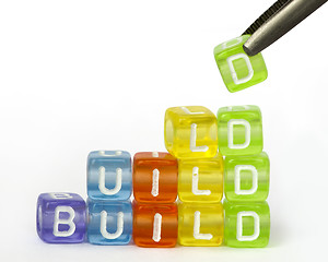 Image showing Text build on colorful wooden cubes