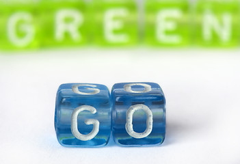 Image showing Text Go green on colorful cubes
