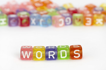 Image showing Text Words on colorful cubes over white