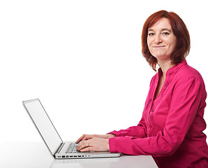 Image showing smiling woman with pc