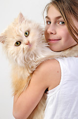 Image showing chilld with a Persian cat