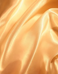 Image showing Smooth elegant golden silk as background