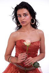 Image showing Beautiful woman holding a rose