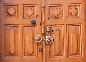 Image showing Old wooden door with knocker