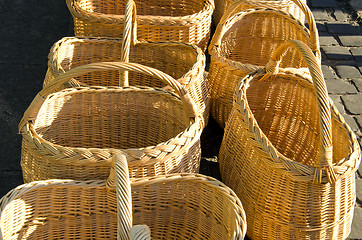 Image showing Wicker hand made baskets selling in outdoor fair 
