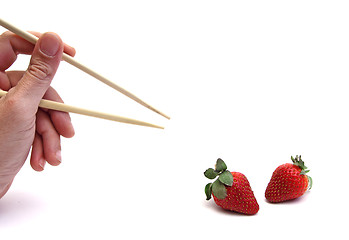 Image showing chopsticks and strawberry