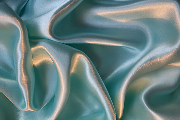 Image showing Smooth elegant blue silk as background