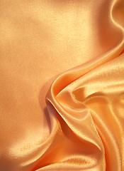 Image showing Smooth elegant golden silk as background